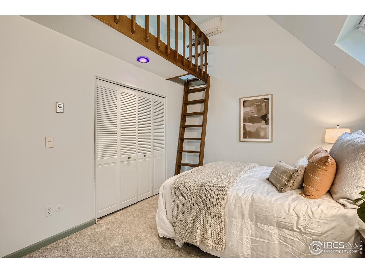 815 Alpine Avenue, Unit 4 Boulder, CO 80304 - Photo 18 of 27 a bedroom with a bed and a window