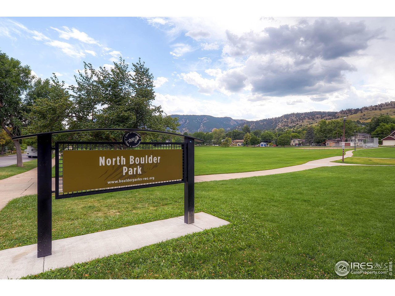 815 Alpine Avenue, Unit 4 Boulder, CO 80304 - Photo 6 of 27 a view of a park with welcome board