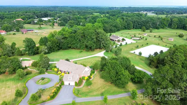 an aerial view of a golf course with outdoor space