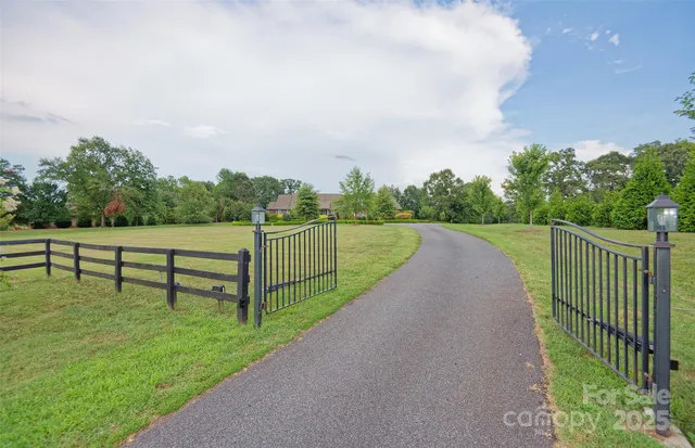 a view of park with bench and trees