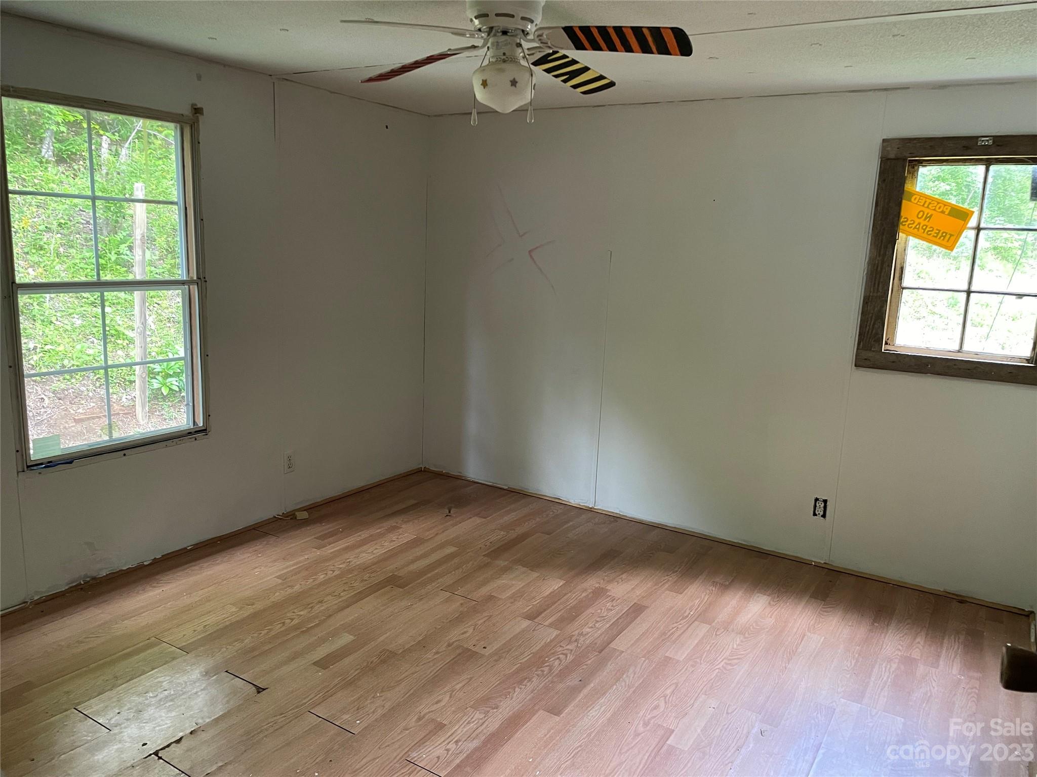 96 Sabbath Drive Old Fort, NC 28762 - Photo 16 of 25 an empty room with a window
