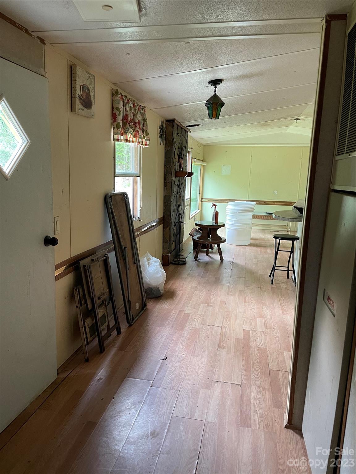 96 Sabbath Drive Old Fort, NC 28762 - Photo 21 of 25 a living room with furniture and a large window