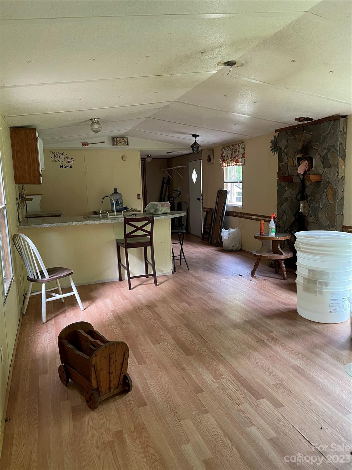 96 Sabbath Drive Old Fort, NC 28762 - Photo 22 of 25 a living room with furniture and a wooden floor
