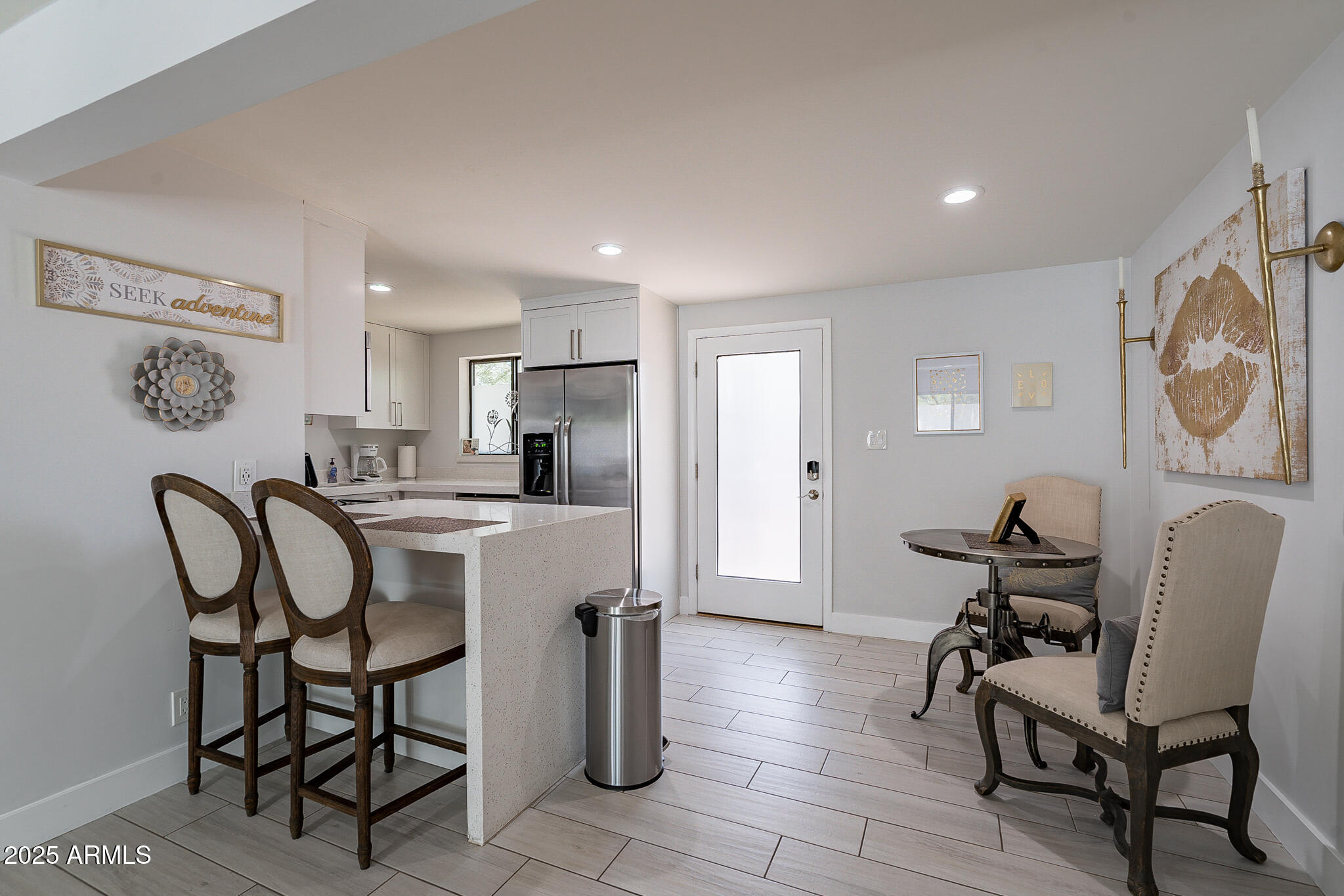 4351 North 36th Street, Unit 2 Phoenix, AZ 85018 - Photo 4 of 24 a view of kitchen with cabinets and outdoor seating