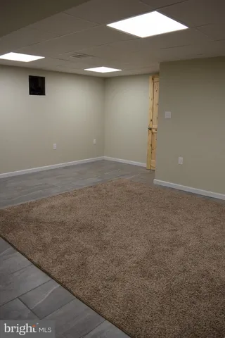 a view of a park with large trees