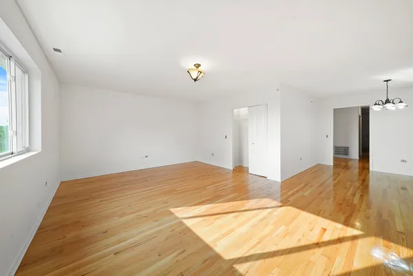 a bedroom with a bed and a cabinets