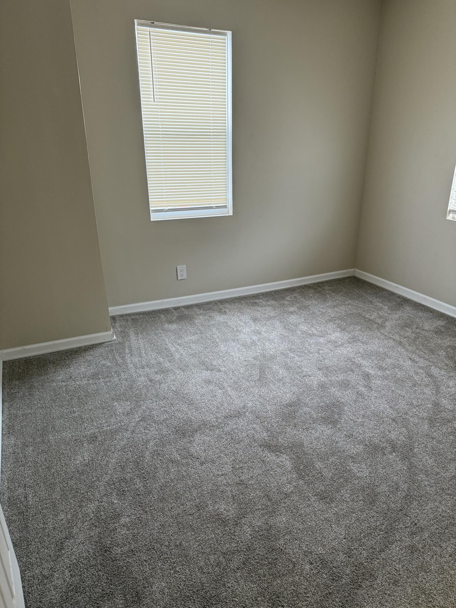 634 Kentucky Street Gary, IN 46402 - Photo 13 of 18 an empty room with a window