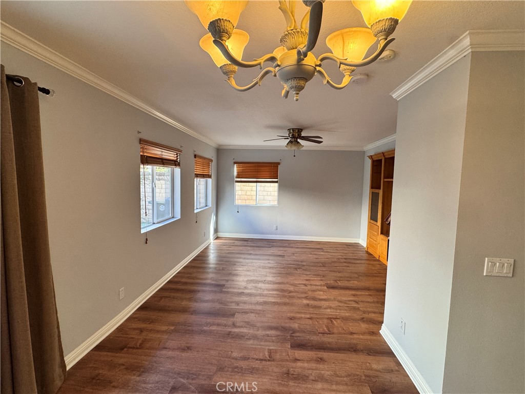 2505 San Simon Street Tustin, CA 92782 - Photo 3 of 3 a view of an empty room with wooden floor and a window