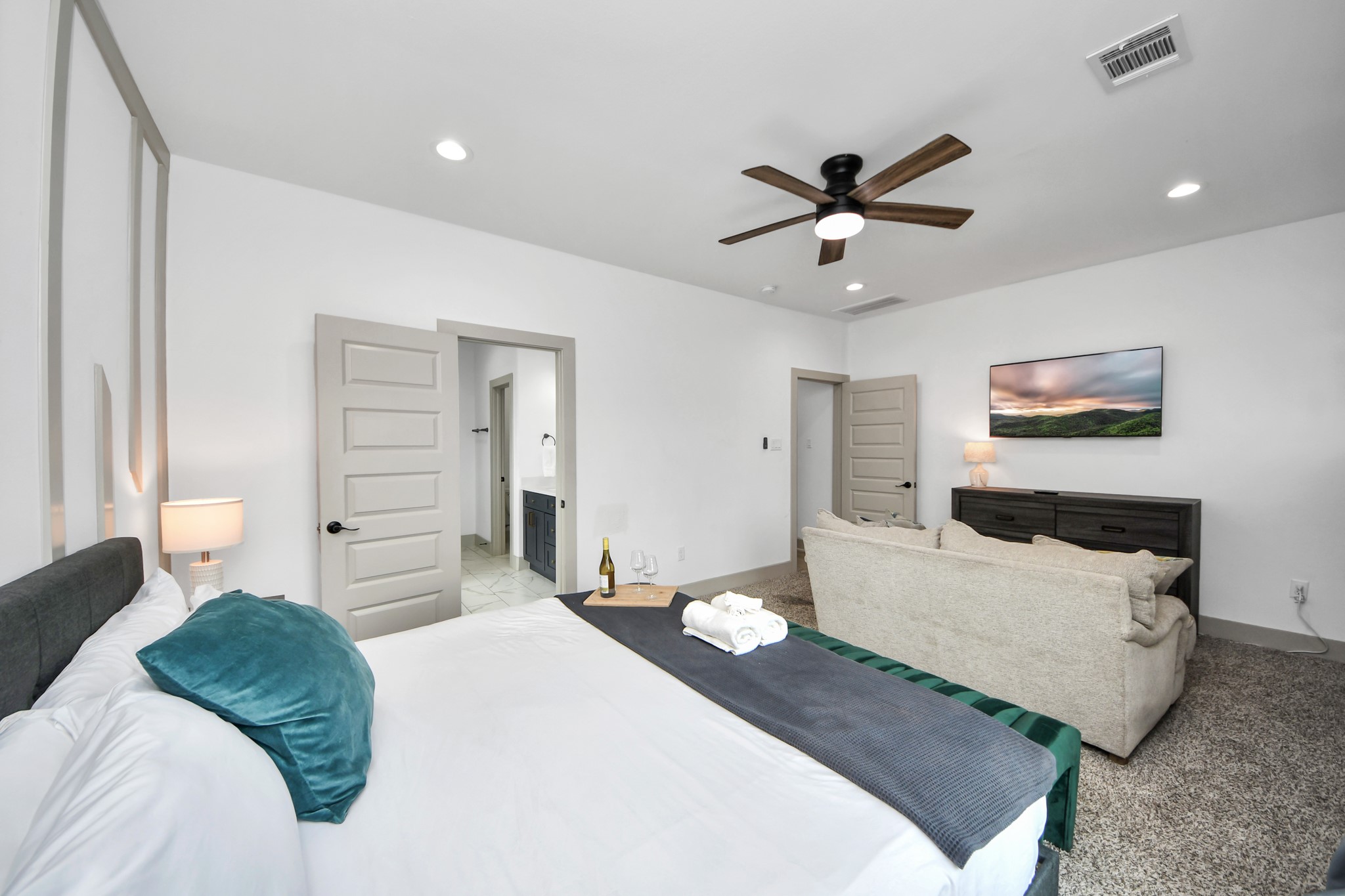 837 West Little York Road, Unit 1 Houston, TX 77091 - Photo 14 of 32 Spacious primary bedroom offering a comfortable private retreat in this modern 77091 duplex.