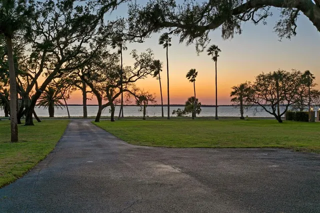a view of road with trees