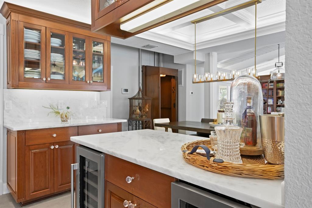 147 Edgewater Drive Dunedin, FL 34698 - Photo 20 of 99 a bathroom with a granite countertop sink and a mirror