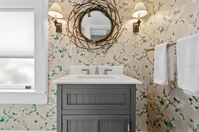 a view of an outside dining space with furniture window and outside view