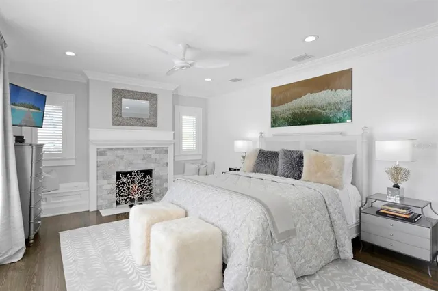 a living room with a mirror and a table