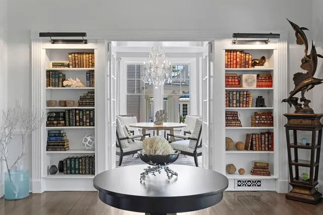 a view of entryway with wooden floor and stairs