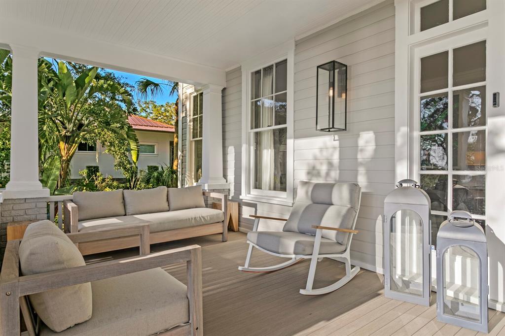 147 Edgewater Drive Dunedin, FL 34698 - Photo 99 of 99 a living room with furniture and a large window
