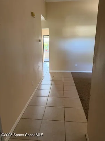 an empty room with a bathroom