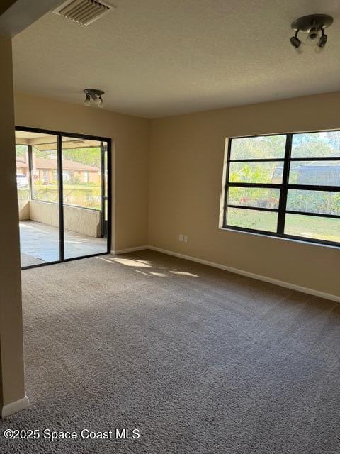 879 Remsen Avenue Northwest Palm Bay, FL 32907 - Photo 7 of 12 an empty room with windows