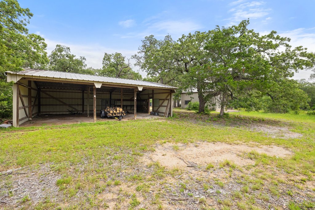 244 Woodway Elgin, TX 78621 - Photo 36 of 40 a front view of a house with a yard and garage