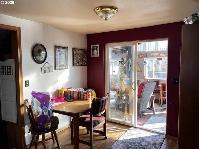 a view of a dining room with furniture window and outside view