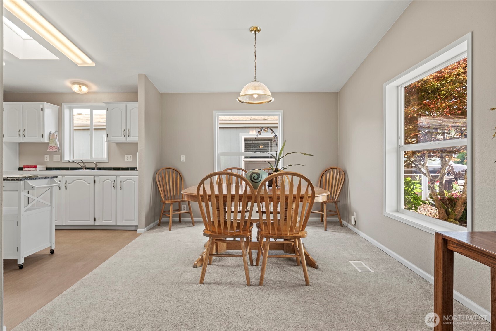 23825 15th Avenue Southeast, Unit 108 Bothell, WA 98021 - Photo 8 of 39 a view of a dining room with furniture window and outside view