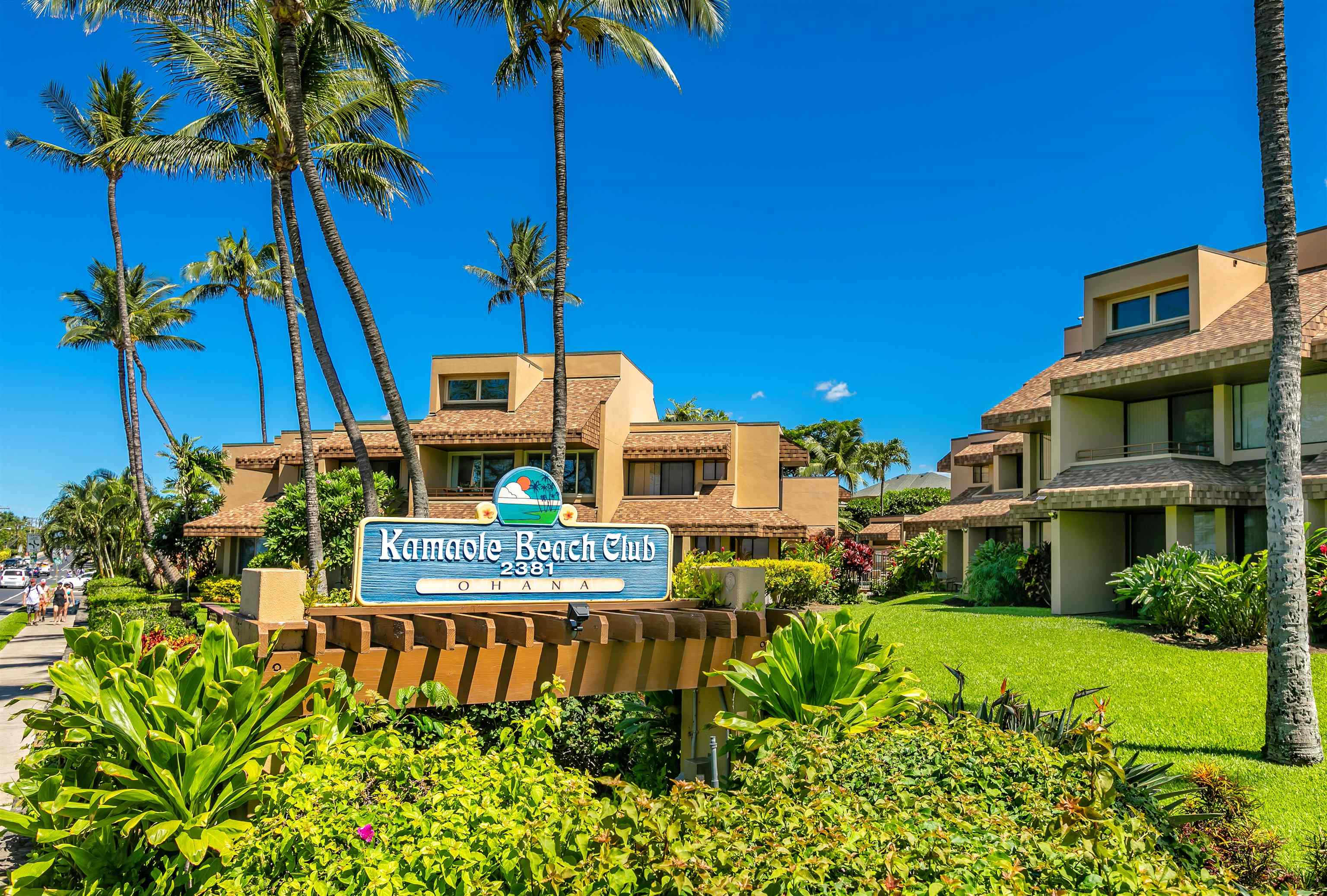 2381 South Kihei Road, Unit C109 Kihei, HI 96753 - Photo 1 of 25 a front view of a house with a yard