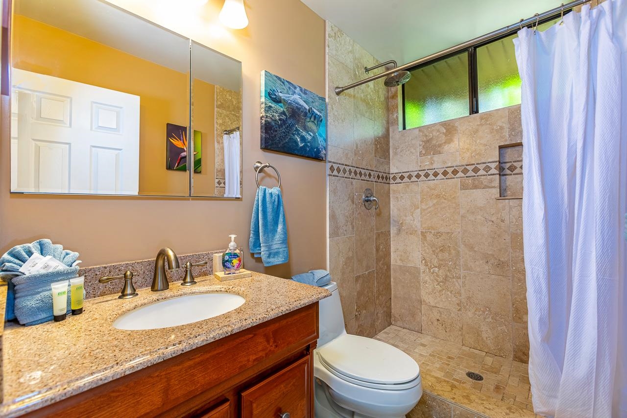 2381 South Kihei Road, Unit C109 Kihei, HI 96753 - Photo 12 of 25 a bathroom with a granite countertop sink toilet and shower