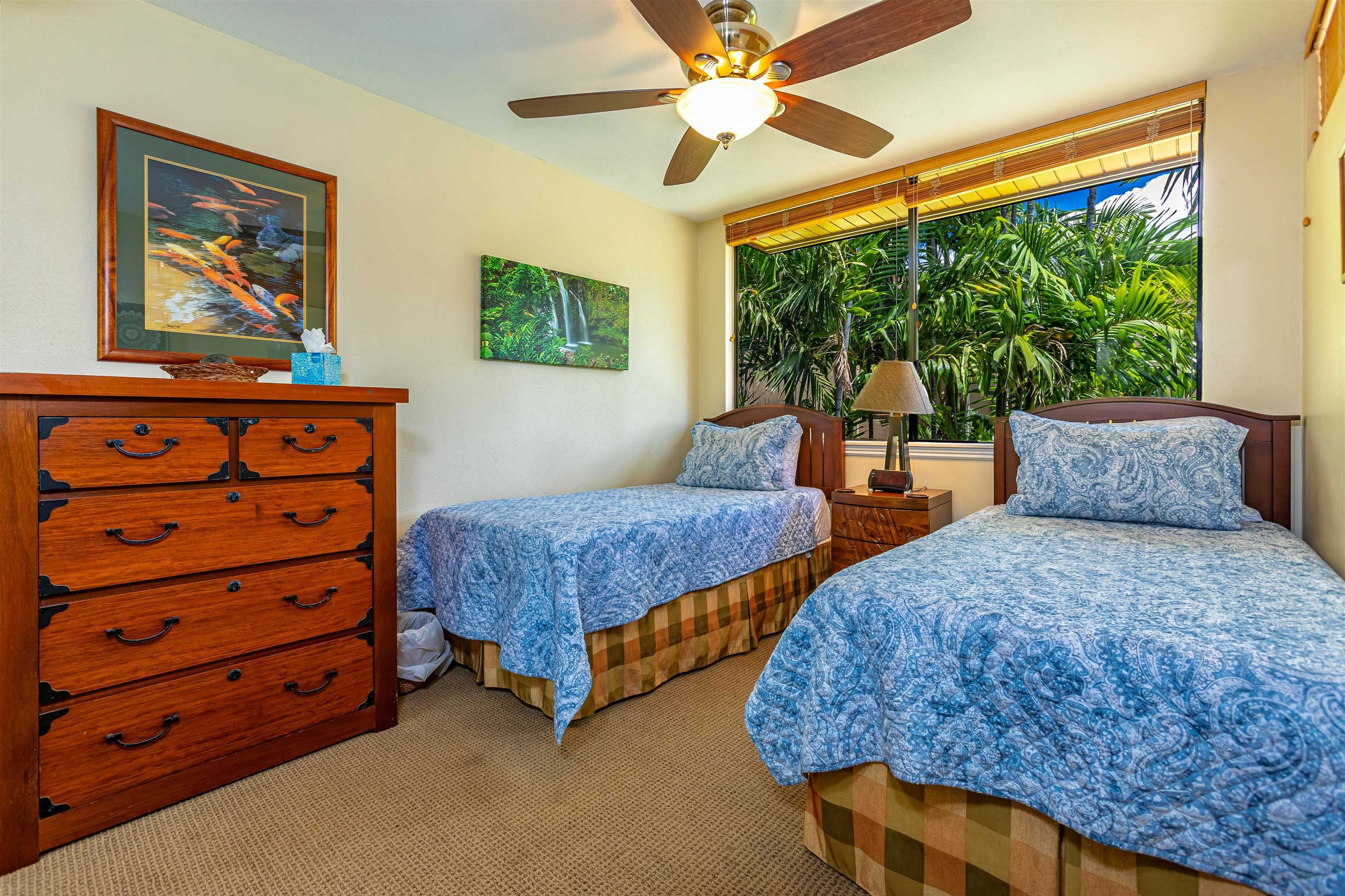2381 South Kihei Road, Unit C109 Kihei, HI 96753 - Photo 18 of 25 a bedroom with 2 bed and a window