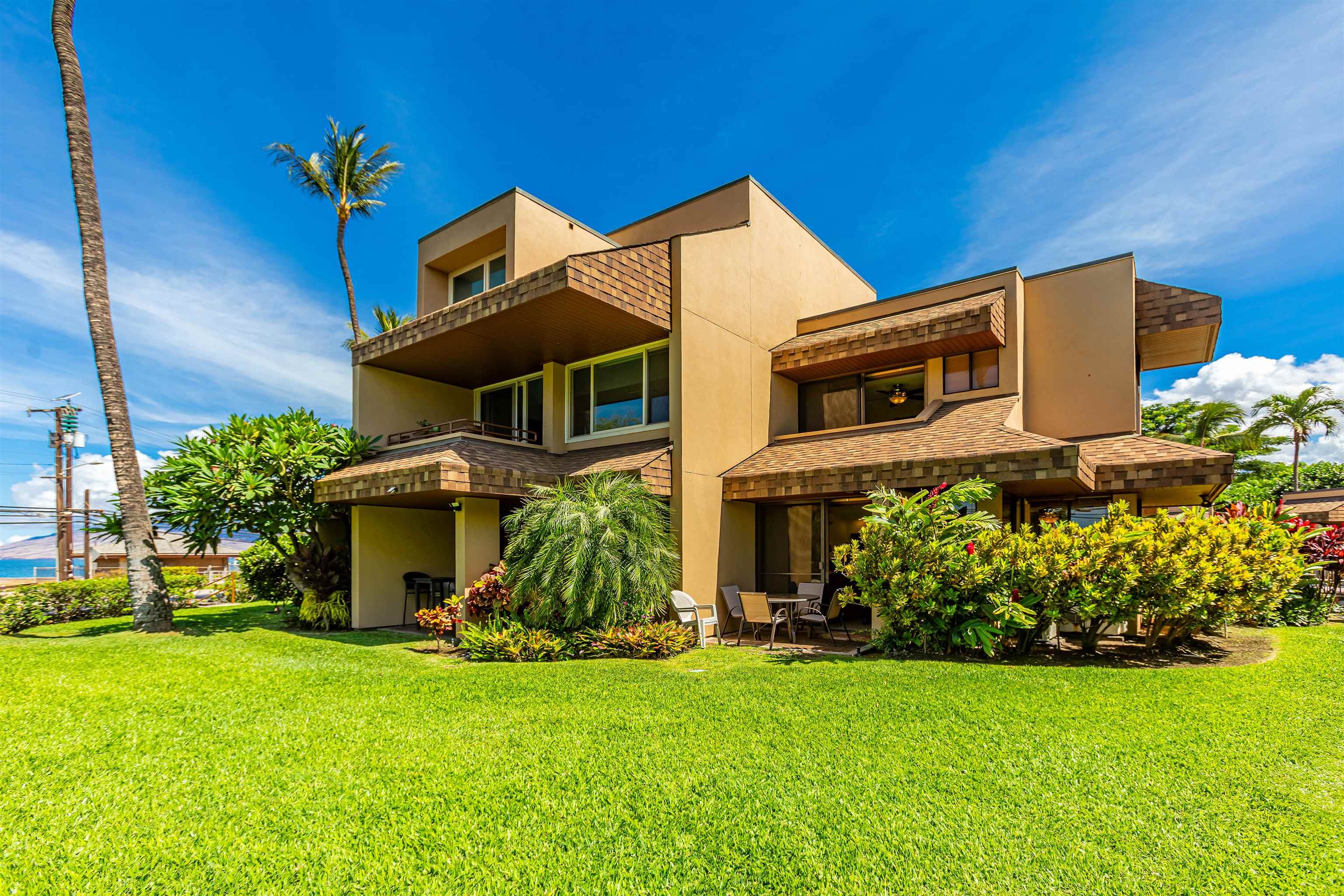 2381 South Kihei Road, Unit C109 Kihei, HI 96753 - Photo 22 of 25 a front view of a house with garden