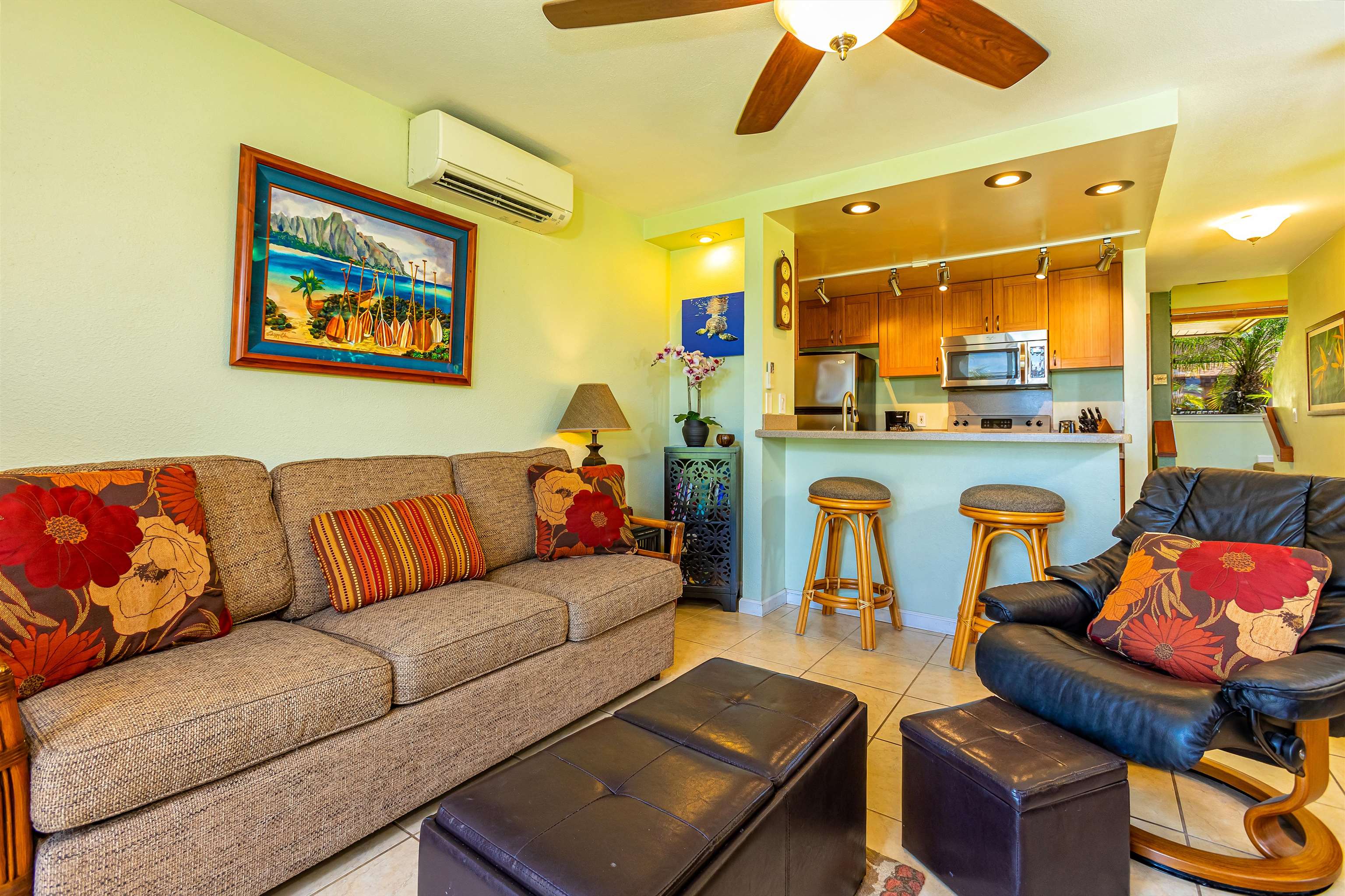 2381 South Kihei Road, Unit C109 Kihei, HI 96753 - Photo 7 of 25 a living room with furniture and a table