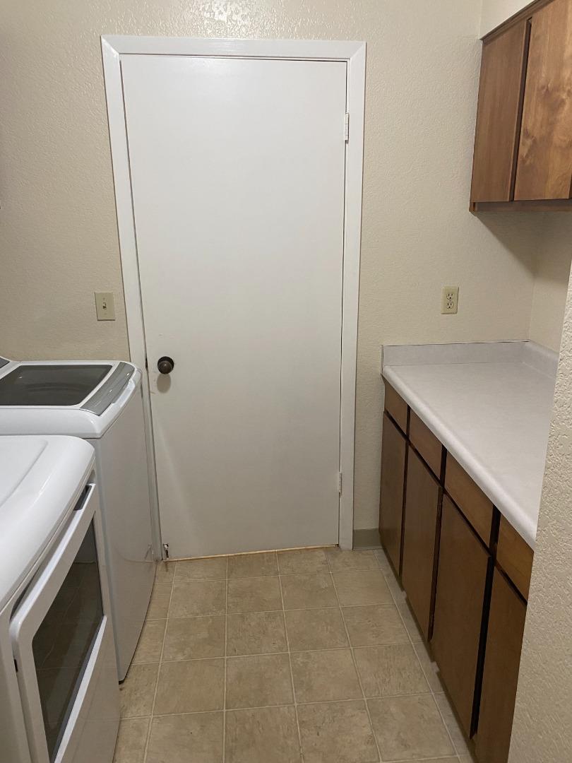 1051 Padre Drive, Unit 7 Salinas, CA 93901 - Photo 12 of 22 a utility room with dryer and washer
