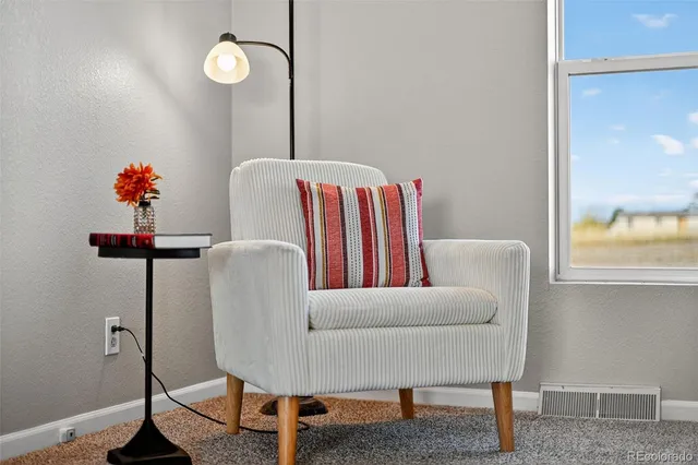 a bed room with a bed and a couch