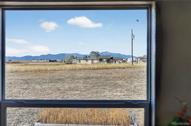 a view of a road with an ocean view