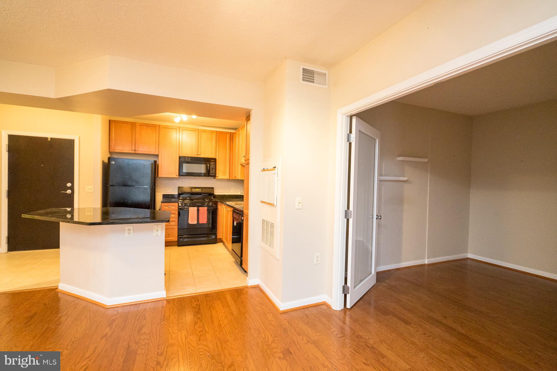 851 North Glebe Road, Unit 421 Arlington, VA 22203 - Photo 4 of 19 Sleek black appliances help w/ modern feel