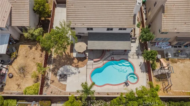an aerial view of residential building and parking space