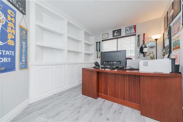 a kitchen with stainless steel appliances a sink a stove and microwave