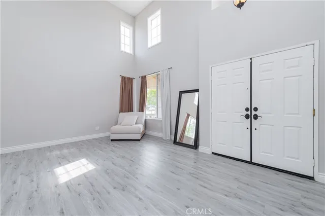 a close view of a refrigerator in kitchen and cabinetry