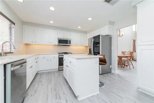 a bathroom with a bathtub shower and a window