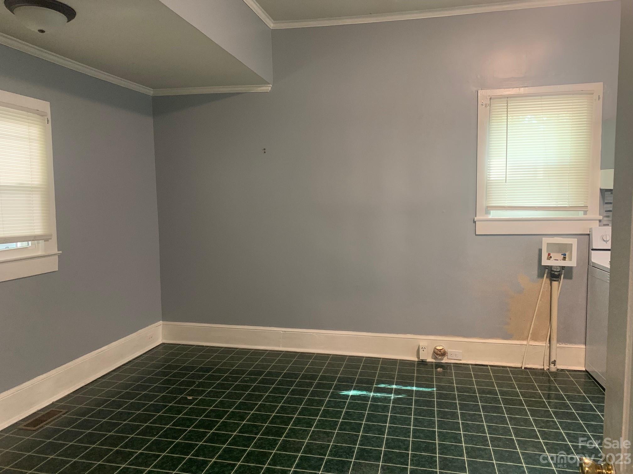 5616 Charlie Walker Road Kannapolis, NC 28081 - Photo 4 of 13 a bathroom with a window