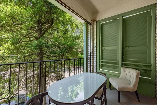 a view of a balcony and chair