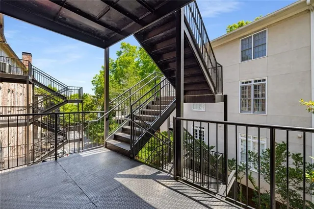 a view of deck with wooden floor and outdoor seating