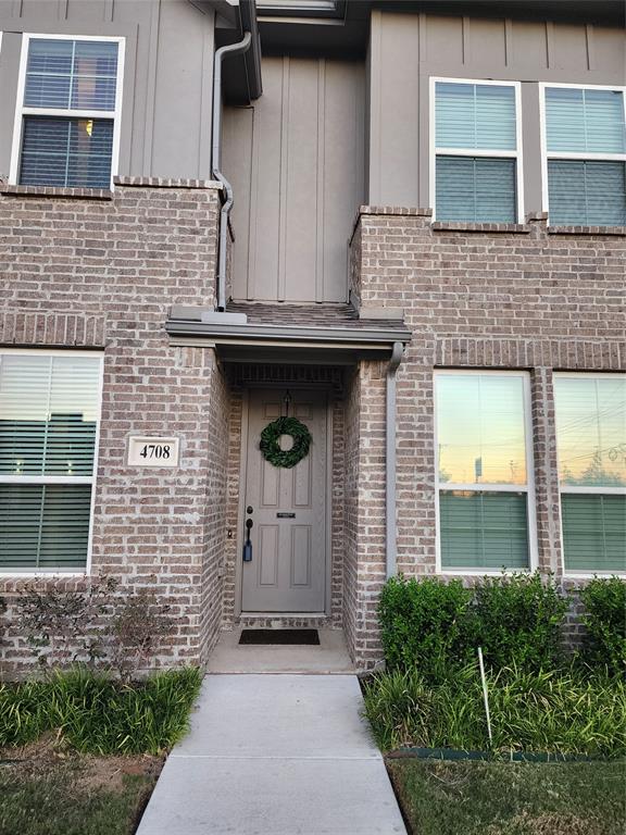a front view of a house with a garage