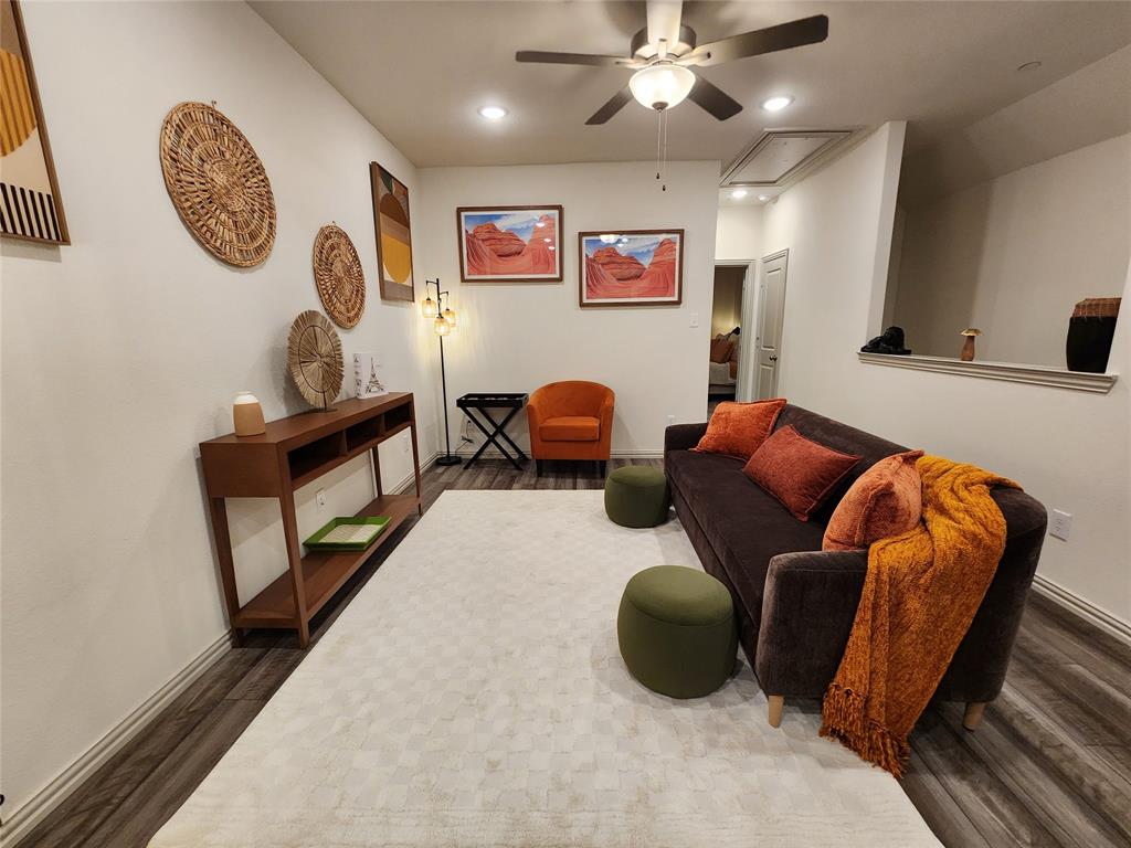 4708 Haltom Road Haltom City, TX 76117 - Photo 15 of 29 a living room with furniture and a mirror