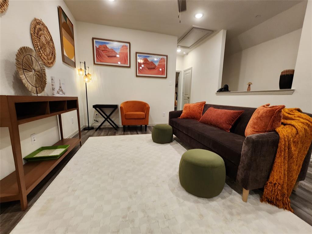 4708 Haltom Road Haltom City, TX 76117 - Photo 17 of 29 a bedroom with furniture and a bed