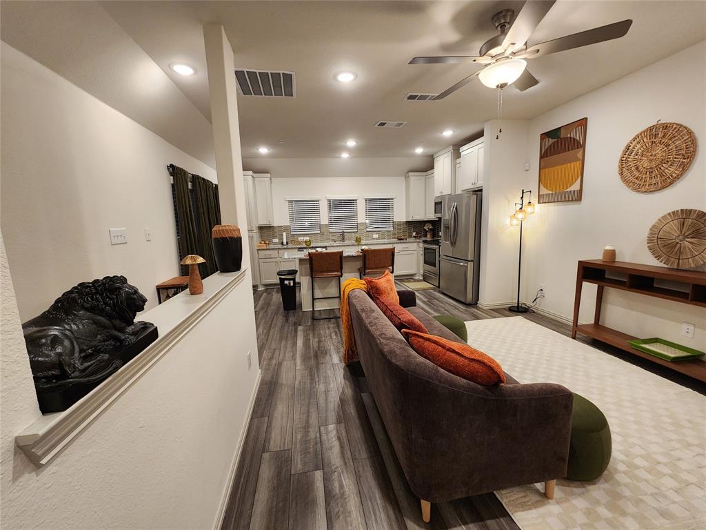 4708 Haltom Road Haltom City, TX 76117 - Photo 19 of 29 a kitchen with granite countertop lots of counter top space and stainless steel appliances