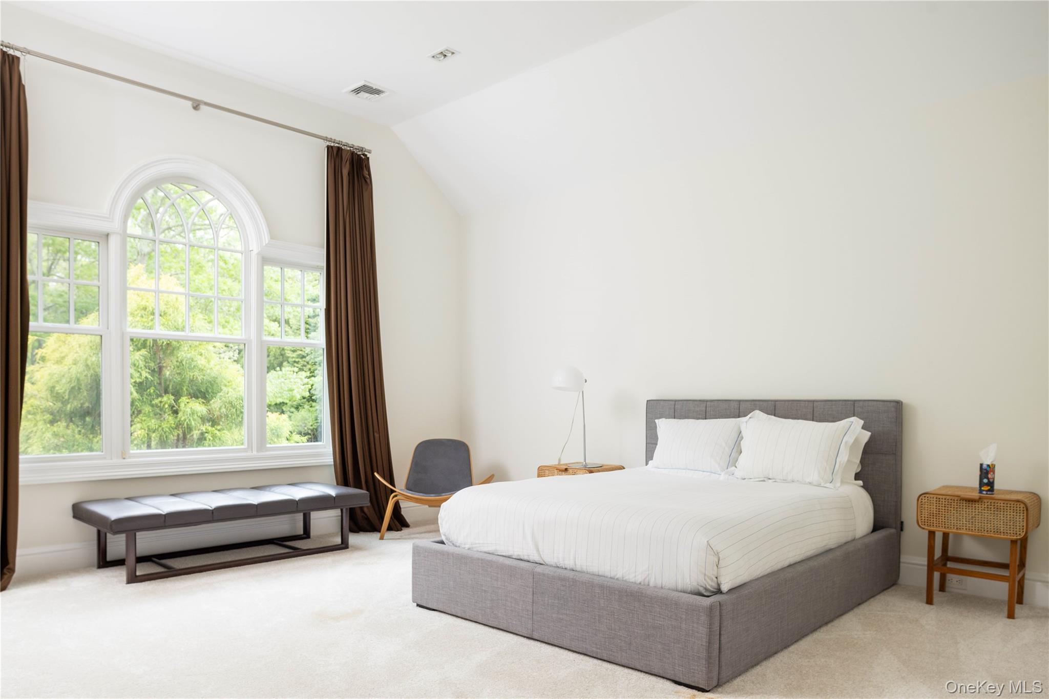 486 Middle Line Highway Bridgehampton, NY 11976 - Photo 18 of 25 a bedroom with a bed and a large window