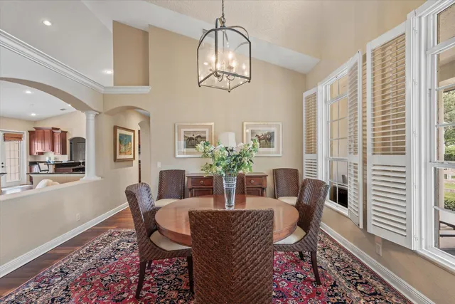 a bathroom with a shower a sink and mirror