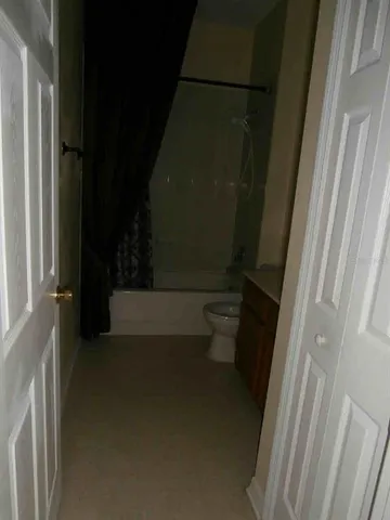 a bathroom with a toilet