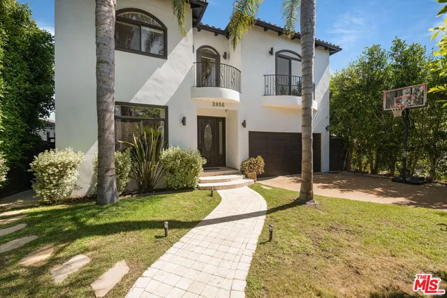 a house view with a outdoor space