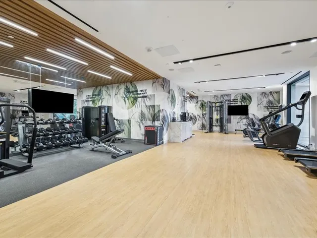 a view of a room with gym equipment