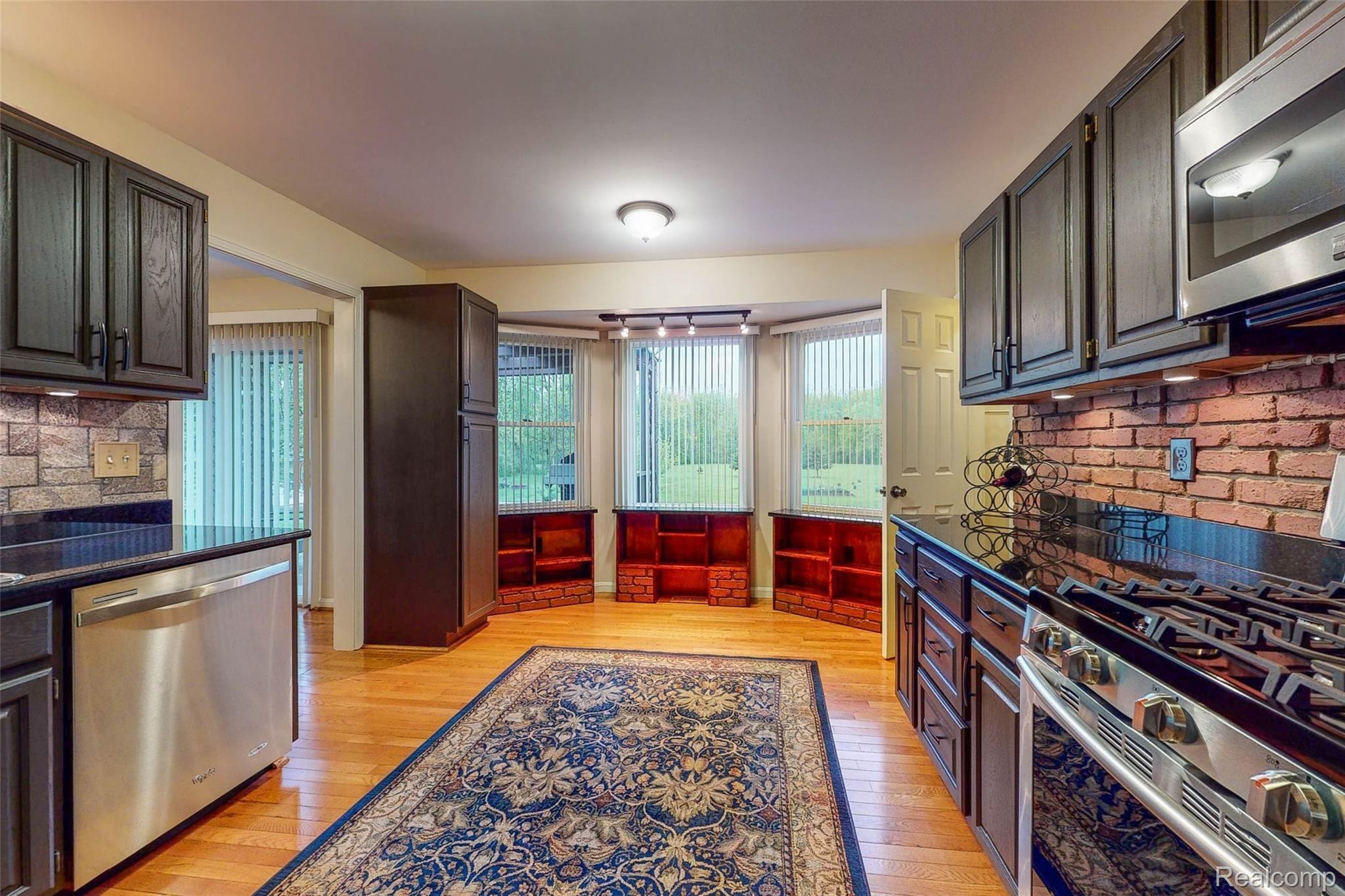 5520 Lowe Road Fowlerville, MI 48836 - Photo 35 of 86 5520-W-Lowe-Rd-12 Kitchen.jpg